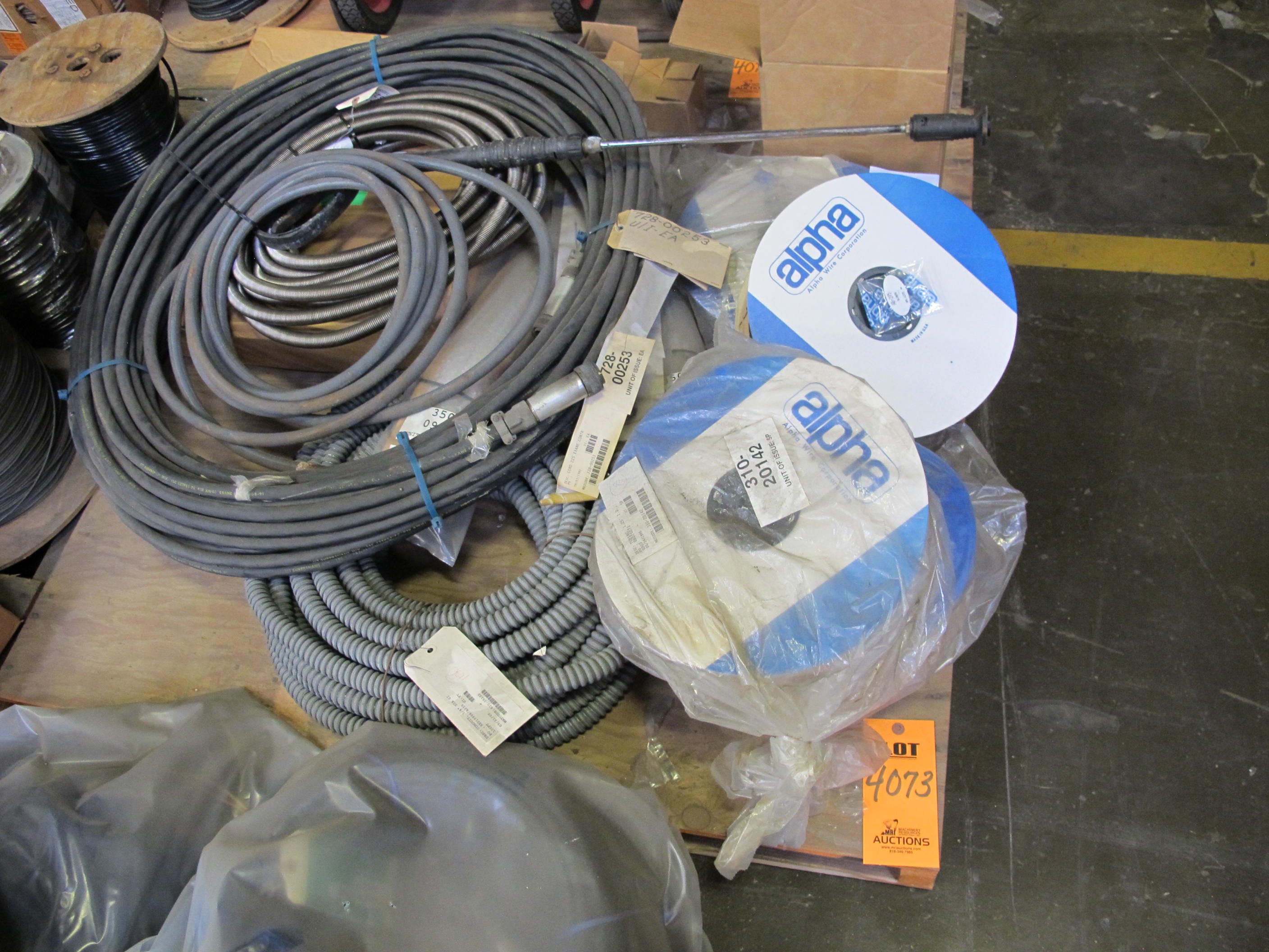 LOT TO INCLUDE: MISC ELECTRICAL CABLE TO INCLUDE: (1) CONDUIT CABLE, 3/4" DIA SIZE, FLEXIBLE KIND, NON-JACKETED GALV STL MATERIAL, (1) ELECTRICAL CORD, 225 FT SIZE, EXANE MATERIAL, CONTROL KIND. 600V, 18 AWG, WITH 17-PIN CIRCULAR CONNECTIONS, (4) SPOOLS OF ALPHA TUBING, GENERAL PURPOSE KIND, (1) CABLE, COAXIAL TYPE, 15M SIZE, PERIFELD-M KIND. LOADING & HANDLING FEE $15-4073